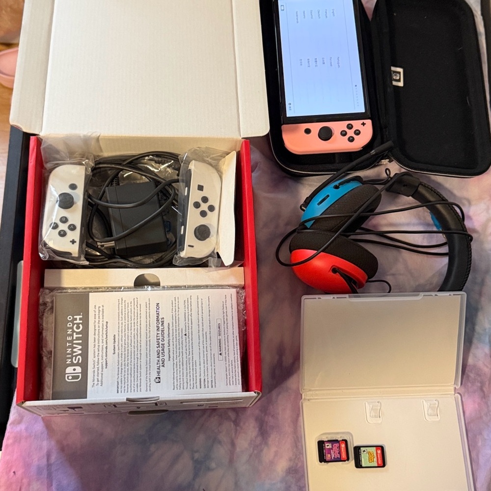 Nintendo Switch Console with Coral Pink & Neon Blue/Red Accessories